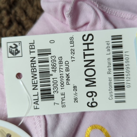 Cute pink holiday onesie with red bow and sleepy reindeer on front - Picture 5 of 5